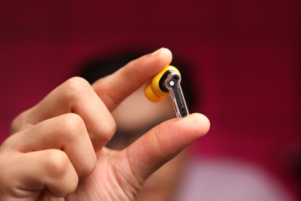 Image of one of the Nothing Ear (a) buds